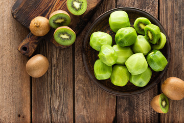 Kiwi fruit on wooden rustic table, ingredient for detox smoothie