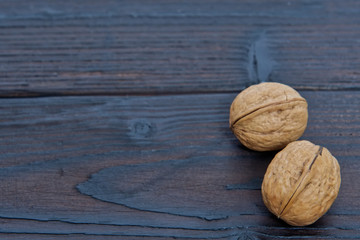 Two walnuts on a table