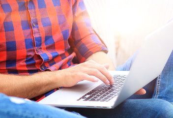 Fototapeta premium closeup of young couple with laptop