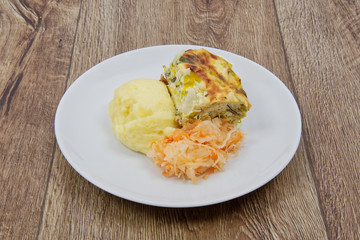 Leek lasagna and potato mash on a table