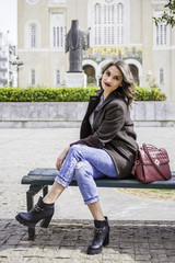 young brunette lady posing on the streets