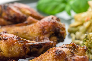 Roasted chicken wings - macro, closeup
