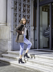 young brunette lady posing on the streets