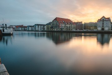 long exposure shot after sunrise in the center of copenhagen on the canal Nyhavn