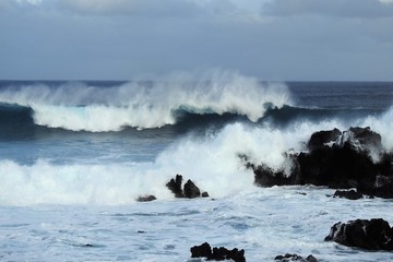 Foamy White Waves Crashing on the Black Shores of Easter Island