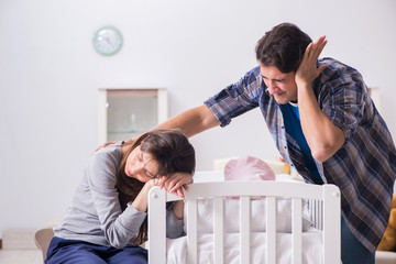 Young dad cannot stand baby crying