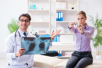 Doctor examining x-ray images of patient