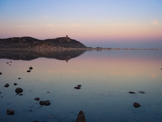 Notteri Pond (famous for the presence of pink flamingos) at dusk. Sardinia, Italy.