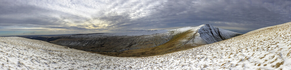 Pen y Fan and Corn Du are the highest mountains in the Brecon Beacons National Park. Panoramic format with winter snow.
 - obrazy, fototapety, plakaty