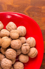 walnuts in red plate