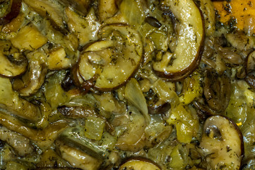 fried with onions and spices Royal mushrooms champignons in a frying pan