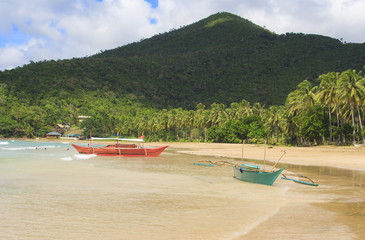 Landscape of the beach of Nagtabon. The island of Palawan. Philippines.