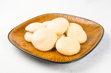 Fototapeta na wymiar brown plate with meringues