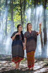 Portrait young karen wonen smiled in the forest local thailand