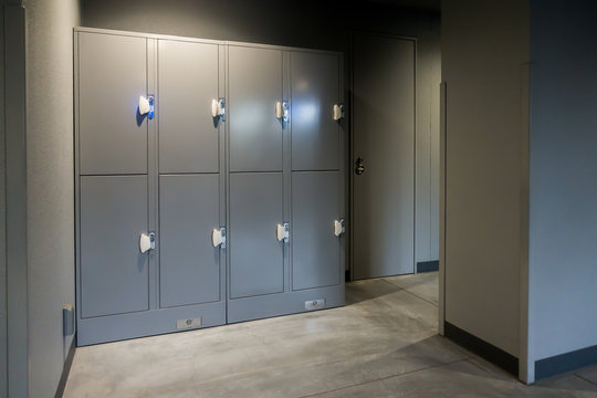 Perspective image with a tall lockers changing room in sport club