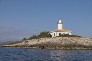 Fototapeta na wymiar Lighthouse in Puerto Acudia, Mallorca, Spain