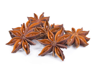 Star anise spice fruits and seeds isolated on white background