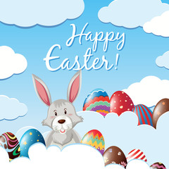 Cute bunny and eggs on the clouds for easter