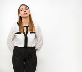 offended girl by the wall in the office with tears in her eyes