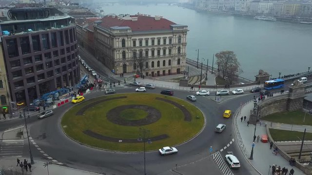 Budapest, Hungary - 4K aerial time lapse (hyperlapse) taken by a drone about Clark Adam Square and Szechenyi Chain Bridge and Parliament of Hungary on a winter afternoon