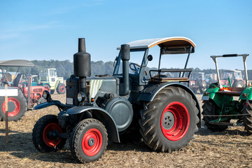 old fashioned tractor - vintage technology