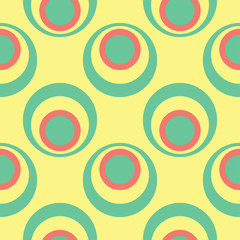 Seamless background with geometric shaped elements. Bright yellow background with pink and green design