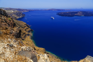 cruise ship near volcano on island of Santorini