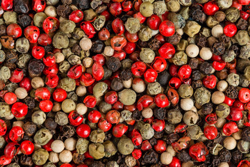 Mixed peppercorns texture. Top view.