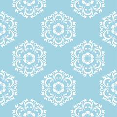 White floral seamless pattern on blue background