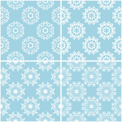 Floral patterns. Set of blue and white seamless backgrounds