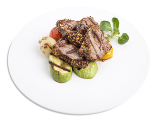 Filet mignon with vegetables.