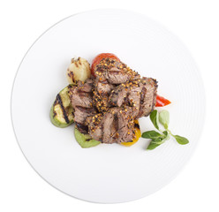 Filet mignon with vegetables.