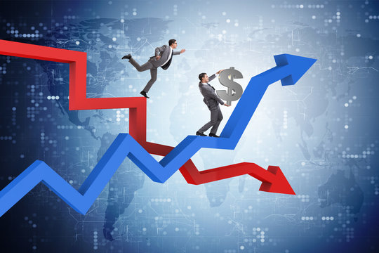 Businessman with charts of growth and decline