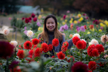 Beautiful woman posing in a japanese garden