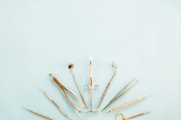 dental tools on color background.