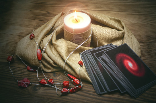 Tarot cards on fortune teller desk table background. Futune reading concept.