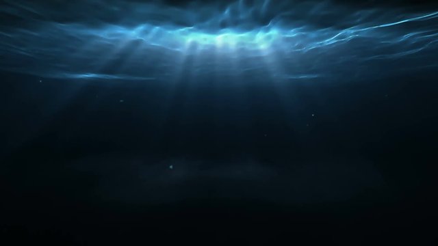 Underwater with floating plankton and sunray through water surface. High quality animation of under ocean, high definition 4k.