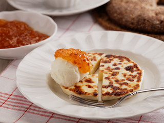 Cheese, cloudberry jam, and cream