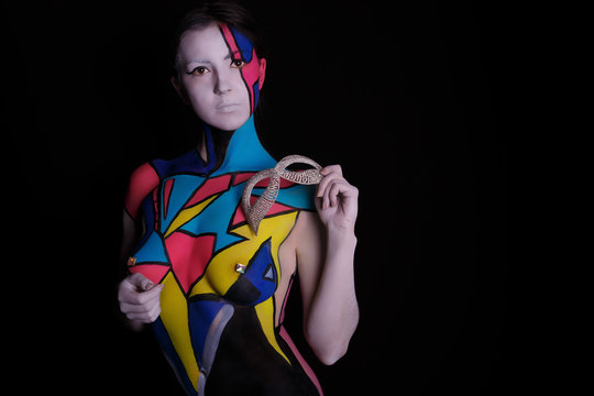 geometry body art painted  girl posing in studio