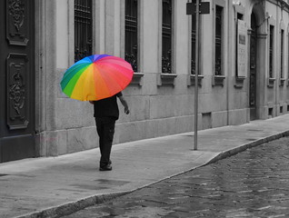A colorated umbrella in street