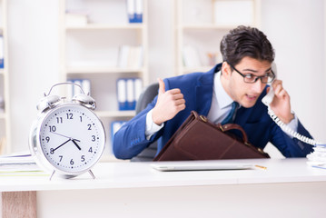 Businessman in rush trying to meet deadline