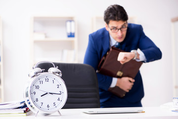 Businessman in rush trying to meet deadline