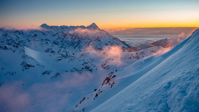 Mountain sunset golden clouds Tatra winter time lapse