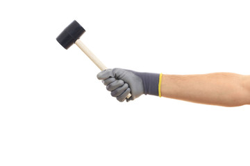 Gloved hand holding a rubber mer on white background