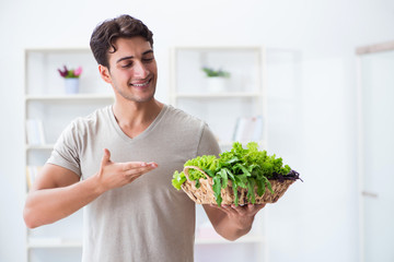 Young man in healthy eating and dieting concept