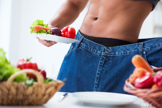 Young man in healthy eating and dieting concept