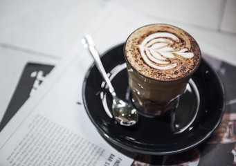 Closeup of hot coffee on table