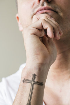Close up of tattoo on the wrist of a man