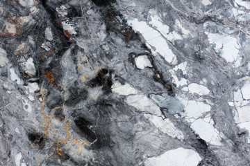 Dark gray marble texture, close up.