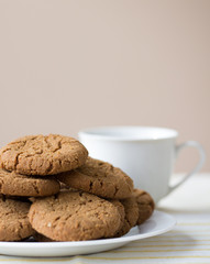 Healthy breakfast with oatmeal cookies or oatcakes and cup of tea or coffee